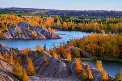 Scenic view of lake against sky during autumn