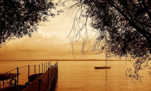 Scenic view of sea against sky at sunset