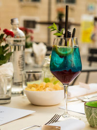 Close-up of food and drink on table at restaurant