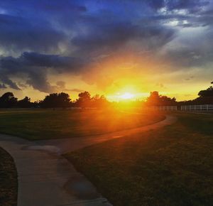 Empty road at sunset