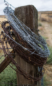 Close-up of fishing net against the sky