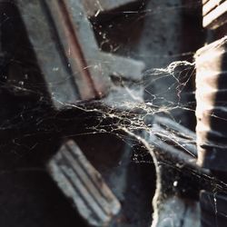 Close-up of broken glass window