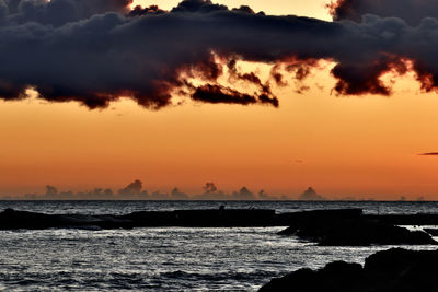 Scenic view of sea against sky during sunset