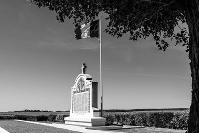 Low angle view of statue against sky