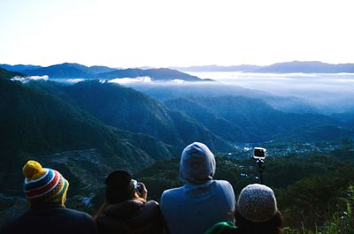 Group of people overlooking landscape