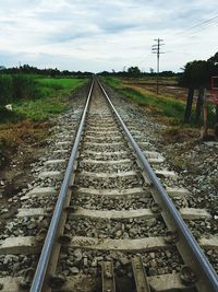 Railroad track passing through landscape