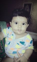 Portrait of cute girl at home