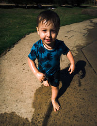 High angle view of boy on floor