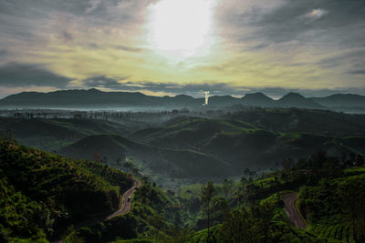 Scenic view of mountains against sky during sunset