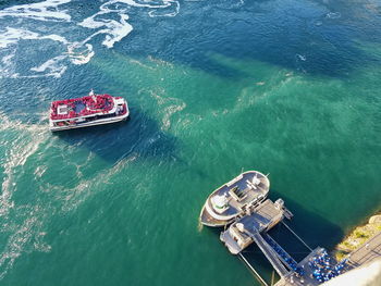 High angle view of ship sailing in sea