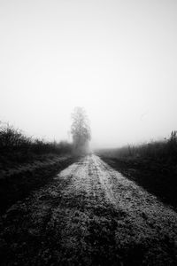 Road passing through field