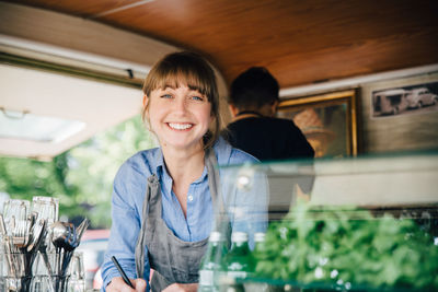 Portrait of a smiling young woman