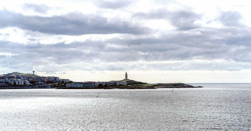 View of city against cloudy sky