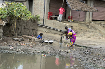 Men working in water