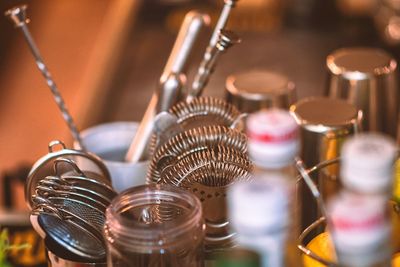 Close-up of various kitchen utensils for sale 