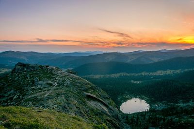 High angle view of mountains against sky during sunset