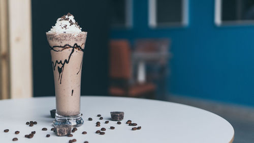 Close-up of iced coffee on table