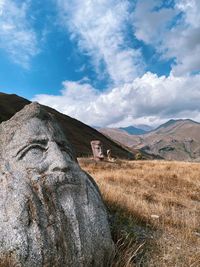 Scenic view of sculptures in field