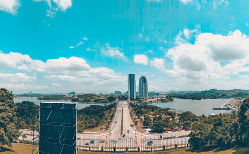 View of city against cloudy sky