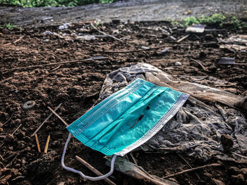 High angle view of blue umbrella on field