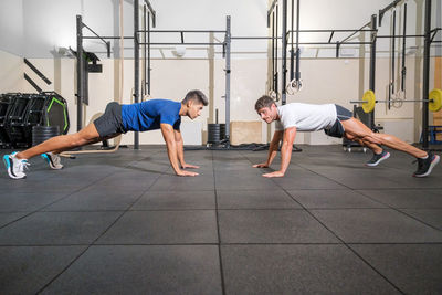 Men exercising at gym