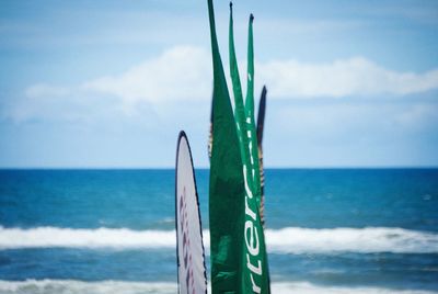 Flags against sea