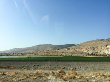 Scenic view of landscape against clear sky