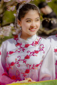 Portrait of smiling young woman