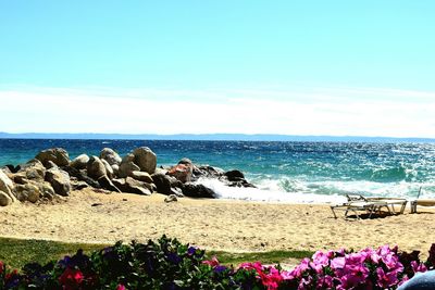 Scenic view of sea against clear blue sky