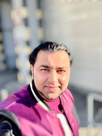 Portrait of smiling mid adult man