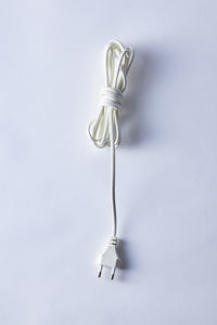 Close-up of electric lamp against white background