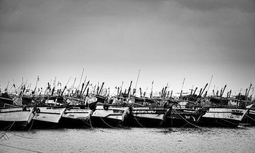 Boats moored in marina