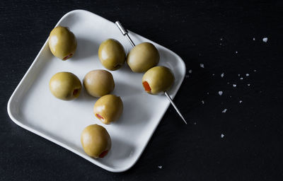 Close-up of fruits in plate on table