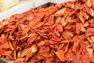 Close-up of dry red chili peppers for sale at market