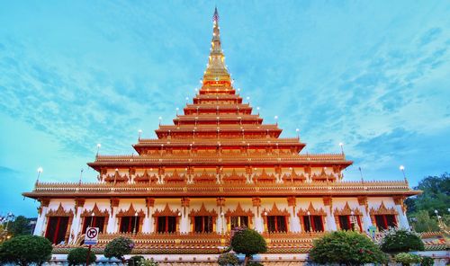 Low angle view of illuminated pagoda against sky