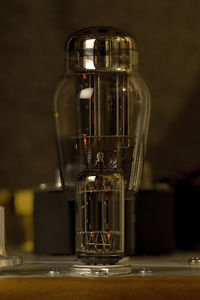 Close-up of tube amplifier on table