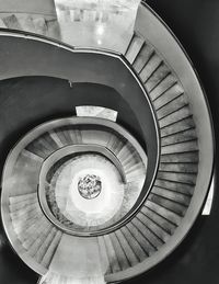 Directly below shot of spiral staircase in building