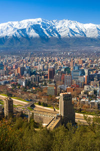 Panoramic view of providencia district with los andes mountain range in the back, santiago de chile