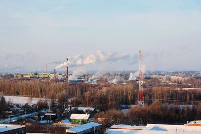 Panoramic view of factory against sky
