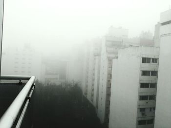 View of cityscape in foggy weather