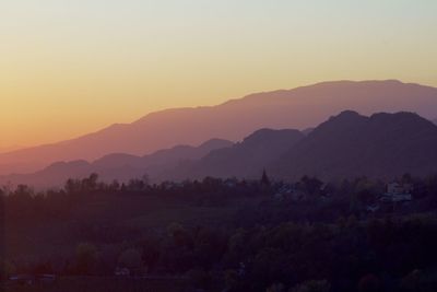 Scenic view of mountains at sunset