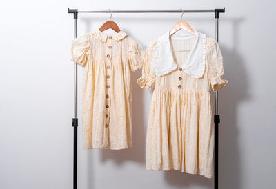 Close-up of clothes hanging on wall