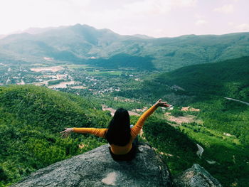 Rear view of woman on mountain