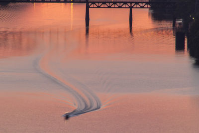 High angle view of boat in ohio river during sunset