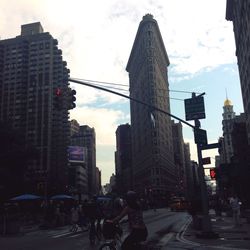 City street against cloudy sky