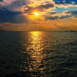 Scenic view of sea against sky during sunset