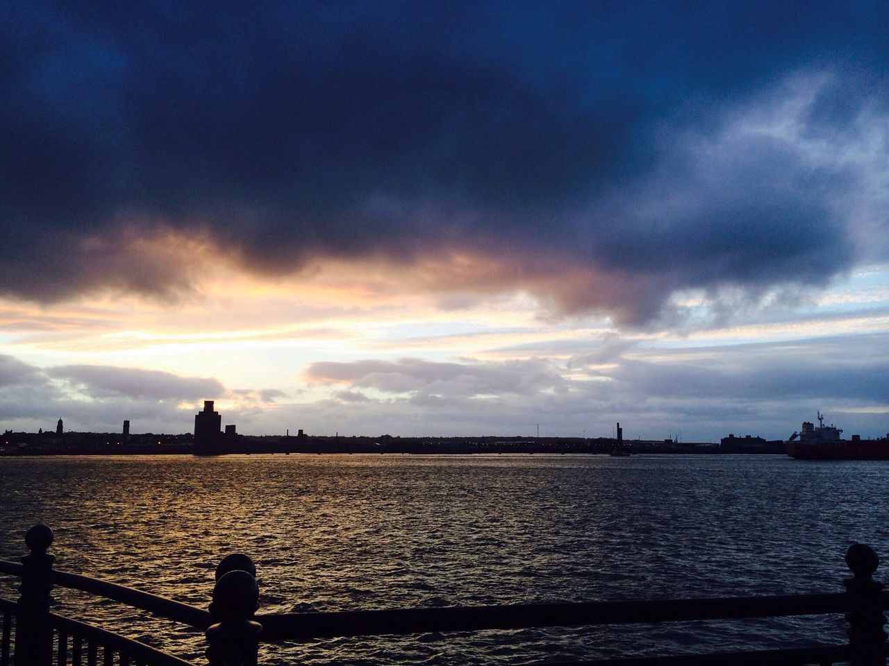 water, sky, silhouette, sunset, sea, cloud - sky, tranquility, scenics, tranquil scene, beauty in nature, nature, cloud, cloudy, built structure, idyllic, dusk, rippled, horizon over water, pier, river