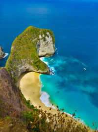 High angle view of rock in sea