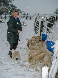 Full length of boy in snow during winter