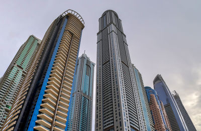 Low angle view of modern buildings against sky